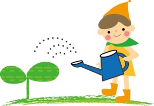こどもが植物に水をあげる